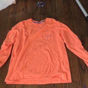 A pink long sleeve shirt